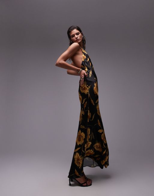 Topshop - Vestito lungo allacciato al collo nero con stampa di rose oro e taglio sbieco