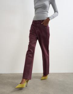 Model wearing Vintage straight mid rise jean in aubergine