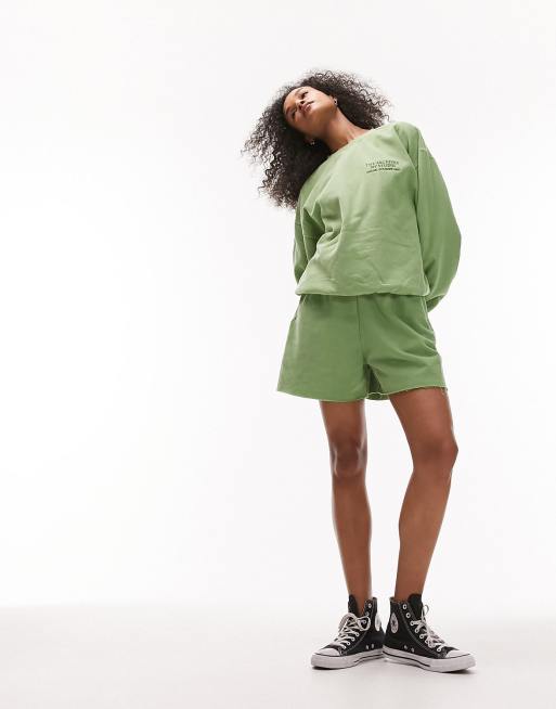 Topshop vintage wash raw hem trackie shorts in green (part of a set)