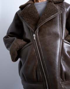 Model wearing Vintage wash shearling aviator bomber in chocolate