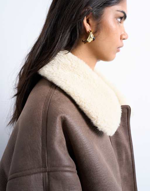 Topshop vintage washed faux shearling oversized bomber jacket in brown
