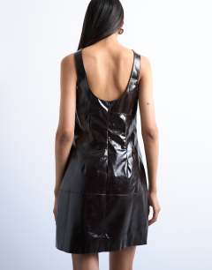 Model wearing Vinyl seamed detail mini dress in washed brown