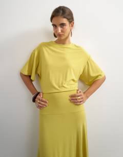 Model wearing Viscose blend jersey dropped waist maxi dress in lime