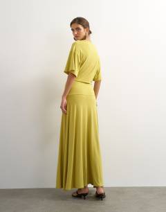 Model wearing Viscose blend jersey dropped waist maxi dress in lime
