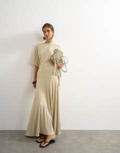 Model wearing Viscose blend jersey dropped waist maxi dress in stone