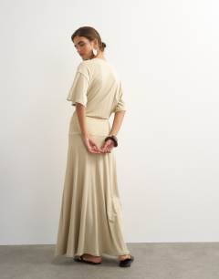 Model wearing Viscose blend jersey dropped waist maxi dress in stone