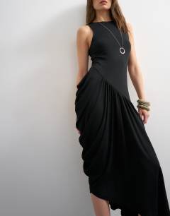 Model wearing Viscose drape bubble hem racer maxi dress in black