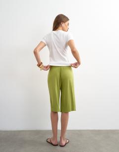 Model wearing Viscose jersey board short in green
