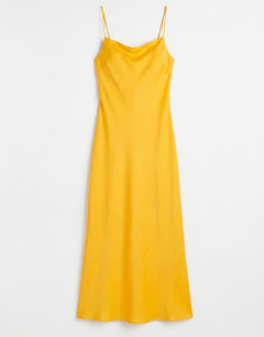 Model wearing Viscose satin low scoop flood length maxi slip dress in orange