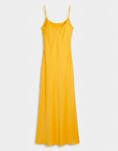Model wearing Viscose satin low scoop flood length maxi slip dress in orange
