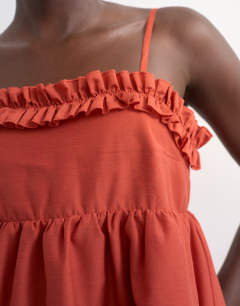 Model wearing Voluminous frill midi dress in rust