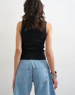 Model wearing Waffle vest in washed black