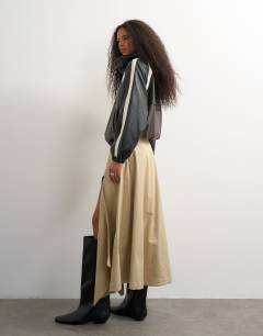 Model wearing Waist detail asymmetric hem trench skirt in stone