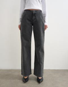 Model wearing Waistbandless relaxed straight jean in washed black
