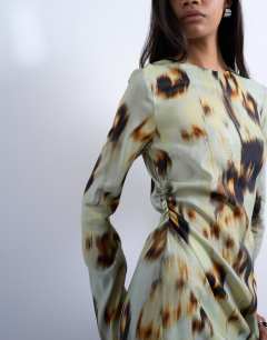 Model wearing Waisted long sleeve mini dress in blur print
