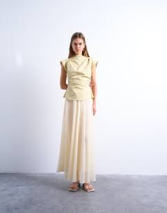 Model wearing Waisted structured shoulder top in buttermilk