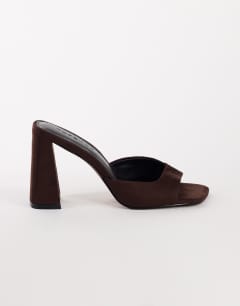 Model wearing Walter high heeled mule in chocolate faux suede