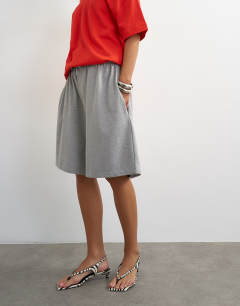 Model wearing Washed long line tie detail shorts in grey marl