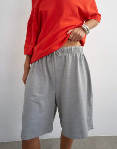 Model wearing Washed long line tie detail shorts in grey marl