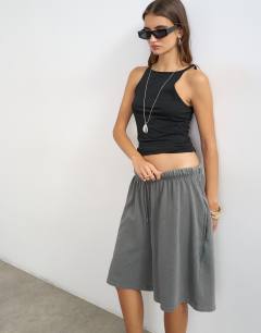 Model wearing Washed long line tie detail shorts in washed charcoal