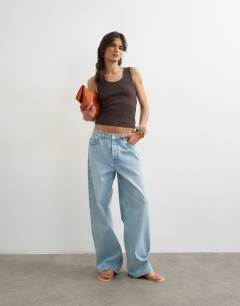 Model wearing Washed waffle vest with woven trim in dark chocolate