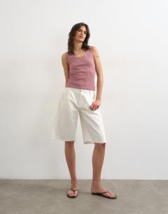 Model wearing Washed waffle vest with woven trim in mauve