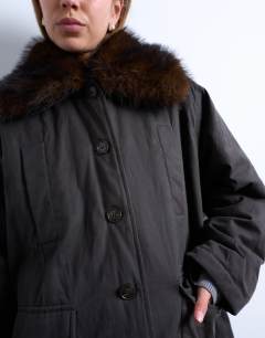 Model wearing Waxy shacket with faux fur collar in chocolate