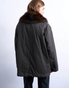 Model wearing Waxy shacket with faux fur collar in chocolate