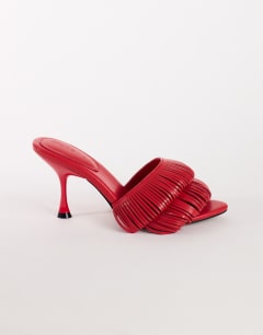 Model wearing Wendy looped fringe heeled sandal in burgundy