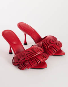Model wearing Wendy looped fringe heeled sandal in burgundy