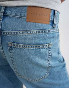 Model wearing Wide crop jean in bleach