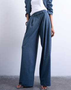Model wearing Wide pleat suit trousers in navy