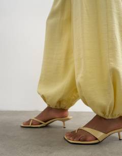 Model wearing Wide waistband balloon trouser in buttermilk