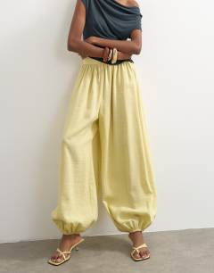 Model wearing Wide waistband balloon trouser in buttermilk