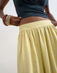 Model wearing Wide waistband balloon trouser in buttermilk