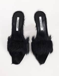 Model wearing Willa cone heel mule in black hair on real leather