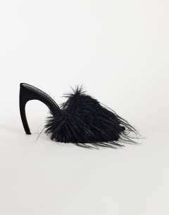 Model wearing Winter faux fur peep heeled sandal in black