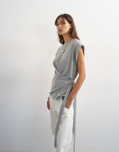 Model wearing Wrap detail cap sleeve top in grey marl