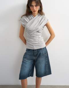 Model wearing Wrap front ruched short sleeve top in grey marl