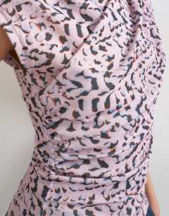 Model wearing Wrap front short sleeve top in multi