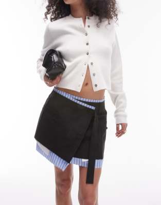 wrap over raw contrast mini skirt in black