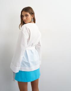 Model wearing Wrap tie detail top in white