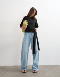 Model wearing Wrap waist tie detail top in black