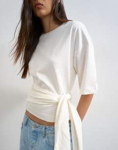 Model wearing Wrap waist tie detail top in ivory