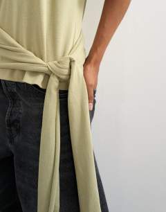 Model wearing Wrap waist tie detail top in khaki