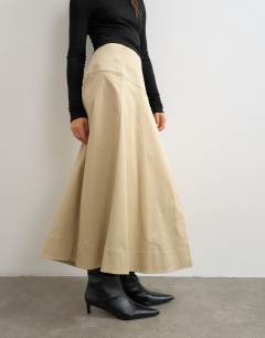 Model wearing Wrap waistband detail trench skirt in stone