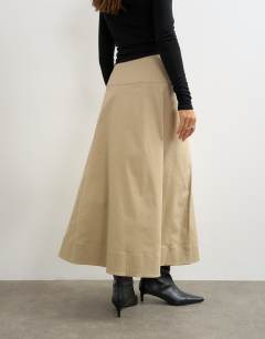 Model wearing Wrap waistband detail trench skirt in stone