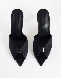 Model wearing Wren peep toe high heel sandal in black