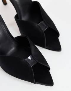 Model wearing Wren peep toe high heel sandal in black