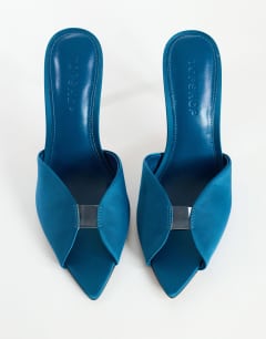 Model wearing Wren peep toe high heel sandal in teal satin
